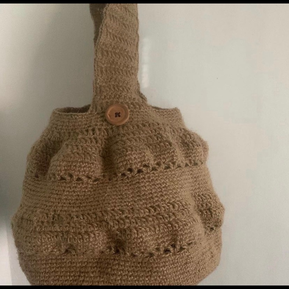 Handmade crochet and knitting clothes and shall.